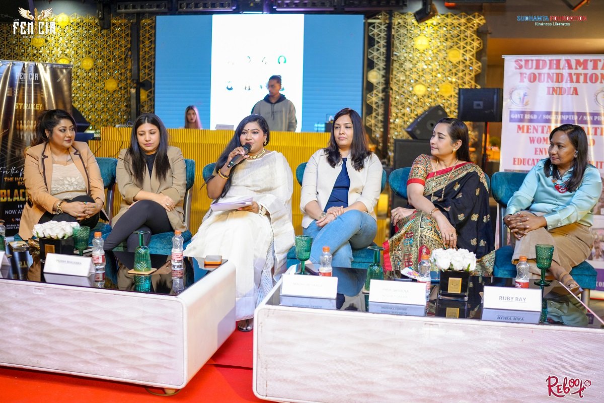 The full panel on stage at a Sahaara event