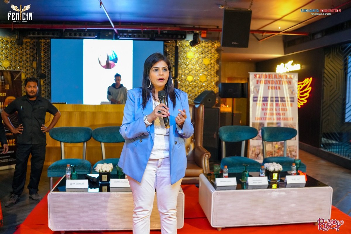 The founder speaking on stage
